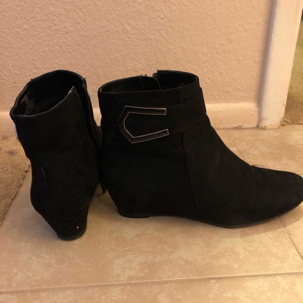 Black suede wedge booties.